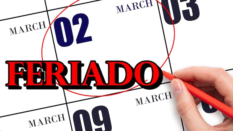 2nd day of March. Hand writing text DUE DATE on calendar date March 2 and circling it. Payment due date. Business concept. Spring month, day of the year concept.