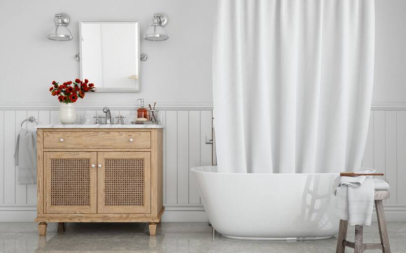 Para eliminar el moho de las cortinas de baño también se puede usar vinagre blanco o bicarbonato de sodio. (Fuente: Freepik)