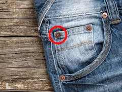 Todos los conocen pero nadie sabe para qué sirven: la función de los botones metálicos en los jeans