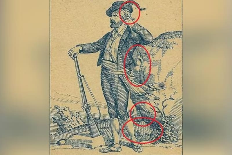 Las respuestas estaban del lado izquierdo del hombre con el rifle.