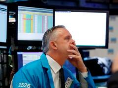 Premarket con comportamiento mixto para acciones y bonos tras default selectivo