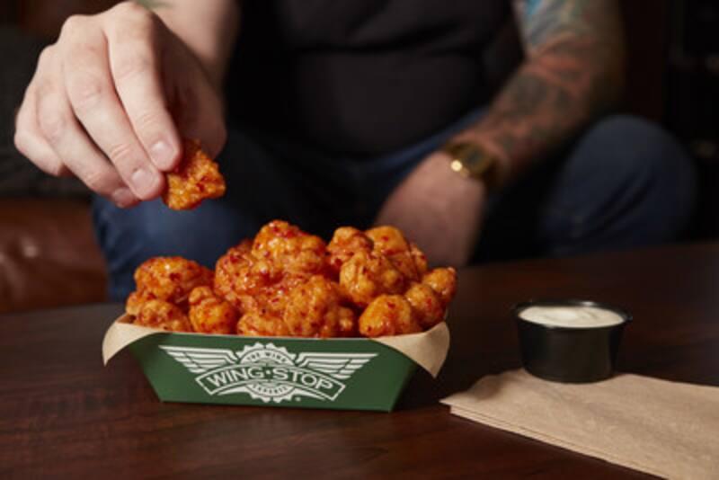 La cadena Wingstop quiere comprar una planta de procesado e integrarse verticalmente