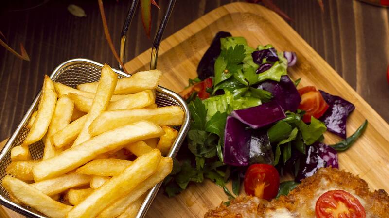 El bodegón que tiene una milanesa con la cara de Messi.