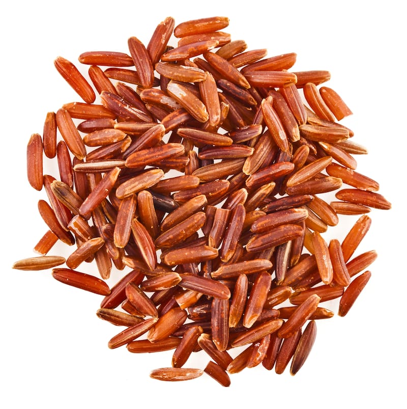 Alguna de las propiedades del arroz rojo tienen que ver con su capacidad para controlar los niveles de azúcar en sangre y reducir el colesterol malo. Foto: Shutterstock