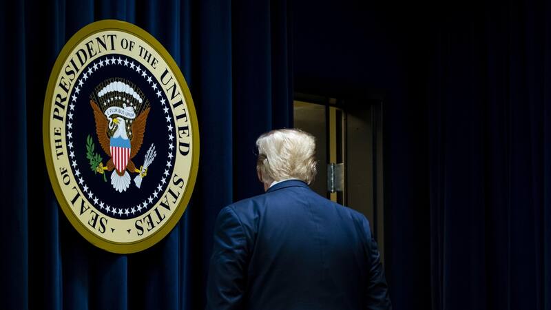 U.S. President Donald Trump departs after speaking during the summit on transforming mental health treatment to combat homelessness, violence & substance abuse,