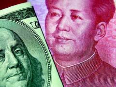 El banco central chino debilita su referencia menos de lo previsto y el yuan abre la ronda estable