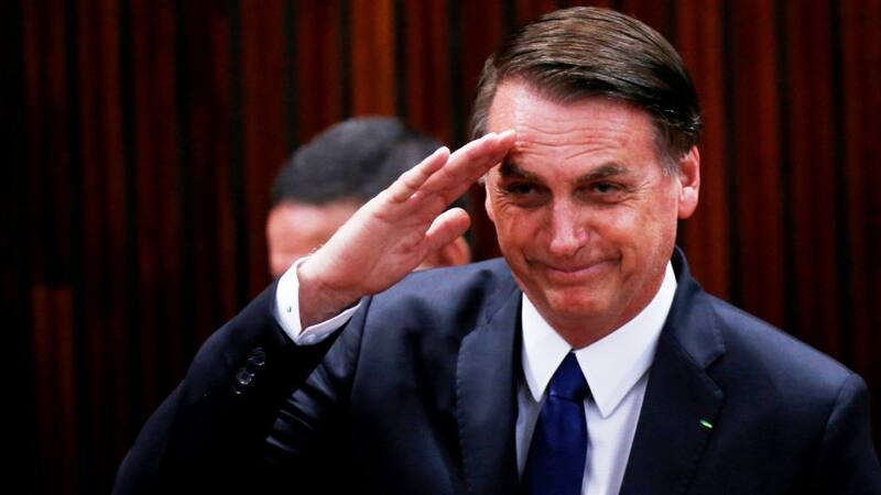 Brazil's President-elect Jair Bolsonaro salutes before receiving a confirmation of his victory in the recent presidential election in Brasilia, Brazil December 10, 2018. REUTERS/Adriano Machado