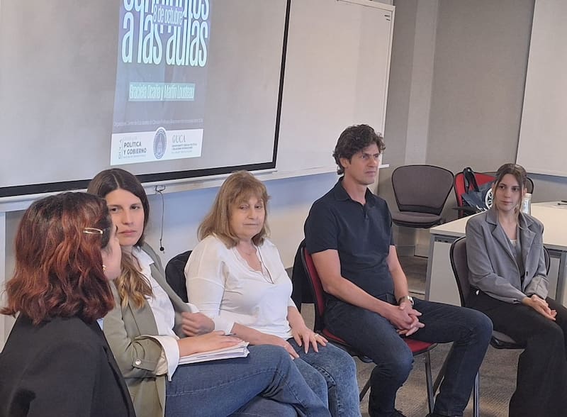 Lousteau y Ocaña, durante una charla con estudiantes de la UCA