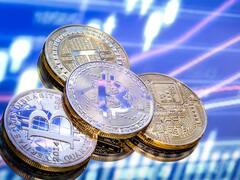 El dólar, bitcoin y Tesla se disparan mientras el mercado se sube a los Trump trades