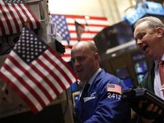 Wall Street cerró con leve alza tras conocer que la Fed mantuvo las tasas