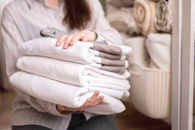 La Técnica de la Toalla puede permitirte secar varias prendas al mismo tiempo. Fuente: Shutterstock.