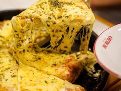 La pizzería que es un ícono de Belgrano, cerró tras la pandemia y ahora volvió a llenarse de fanáticos y seguidores de sus porciones llenas de muzzarellla