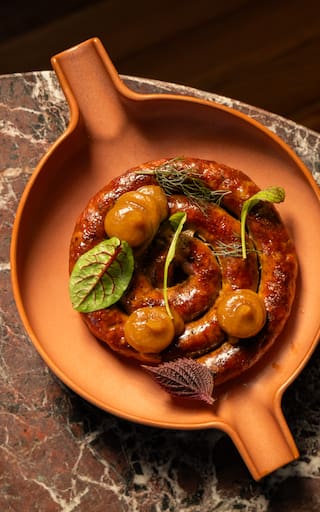 Asadero: el nuevo restaurante con cocina de fuegos en una casona centenaria de Chacarita