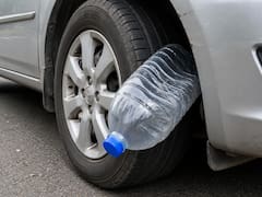 Qué significa encontrar una botella en la rueda del auto y por qué es importante saber cómo actuar