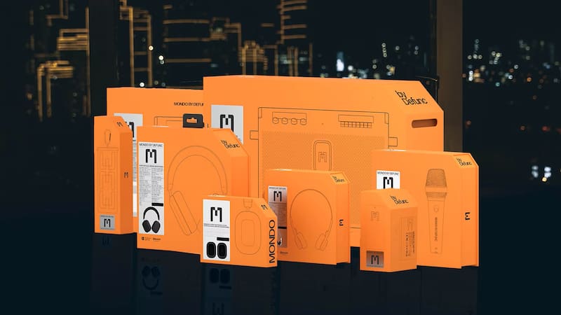 La línea completa de productos MONDO en sus característicos packagings naranjas con esquinas cortadas en ángulo. La experiencia sensorial comienza desde el unboxing, con cajas que anticipan la atención al detalle de la marca sueca.