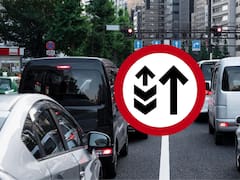 Qué significa la señal de tránsito de dos flechas negras apuntando hacia arriba y dos figuras en forma de “V”
