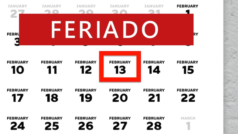Close-up of the date February 13th marked with a red cursor on the wall calendar 2026