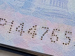 Qué significa el número perforado en el libro de pasaporte americano y para qué sirve que esté ahí