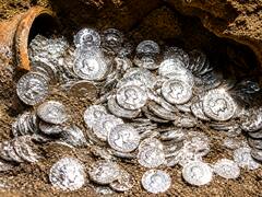 Archaeologists discover an 1,800-year-old Roman treasure with more than 40,000 buried coins