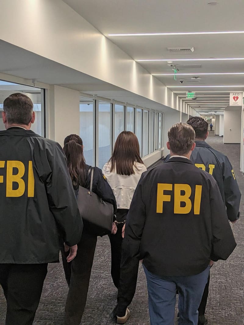 FBI arrests Wanying Zhang at the LAX international airport.