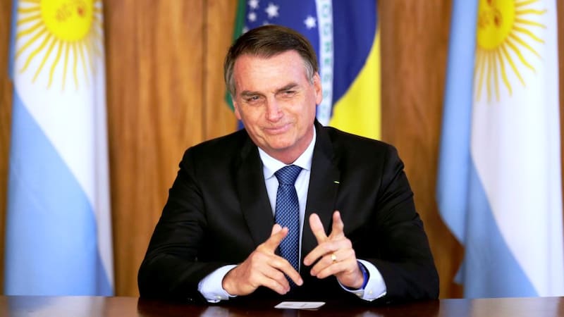 FILE PHOTO: Brazil's President Jair Bolsonaro gestures during a meeting with Argentina's President Mauricio Macri, at the Planalto Palace in Brasilia, Brazil January 16, 2019. REUTERS/Ueslei Marcelino/File Photo