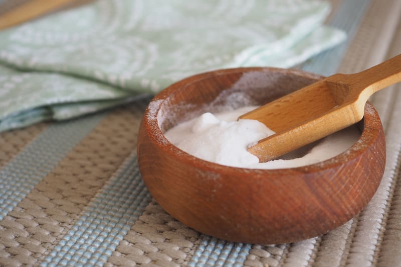 How can you clean the fridge with baking soda?