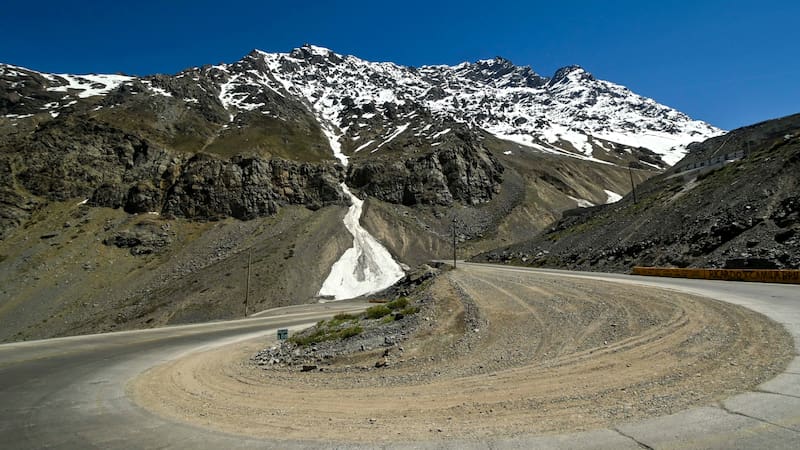 Los Caracoles desert highway, with many curves, in the Andes mountains. Way to Portillo