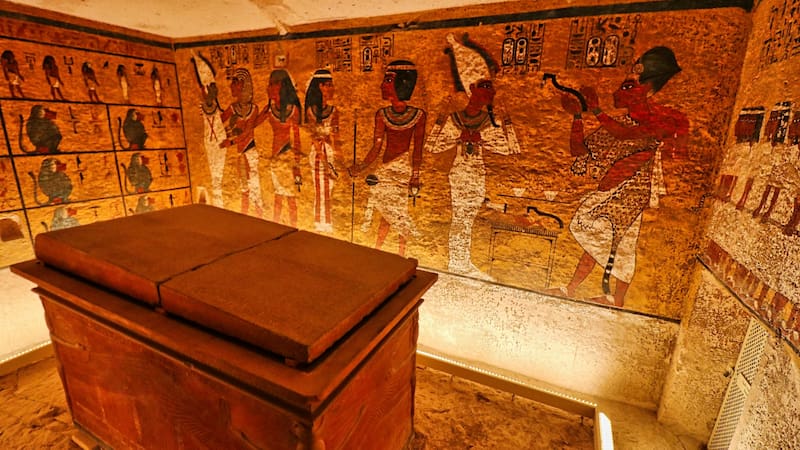 Luxor,Egypt,January 1,2020:Sarcophagus of Pharoah Tutankhamun with wall reliefs from the Book of the Dead inside the famous Tomb of Tutankhamun,KV62,found by Howard Carter in the Valley of Kings