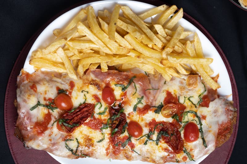 Milanesa napolitana de La Capitana.