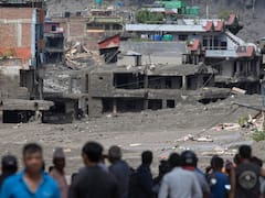 Una violenta inundación deja un centenar de víctimas y más de 900 desaparecidos
