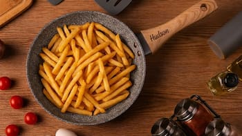 El secreto mejor guardado de los restaurantes para lograr unas papas fritas crujientes y ligeras