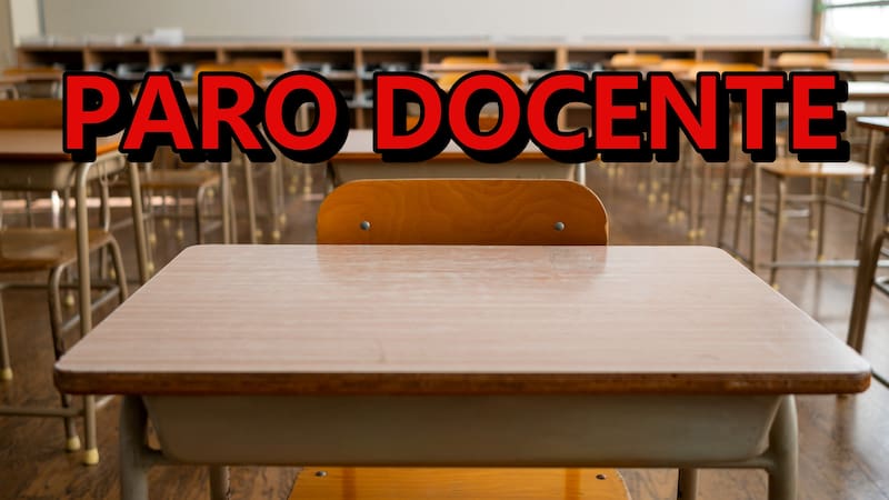 Empty Japanese school classroom with wooden desks and chairs