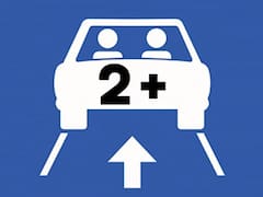 Qué significa la señal de tráfico con un rombo blanco sobre fondo azul y qué conductores pueden utilizar ese carril