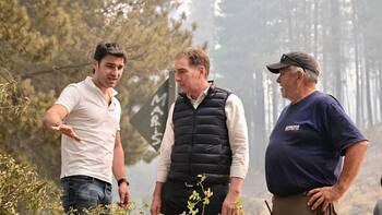 Santilli fue a negociar por la reforma laboral y terminó en un recorrido por los incendios