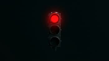 Qué significa que un semáforo tenga la luz roja intermitente y qué debe hacer el conductor