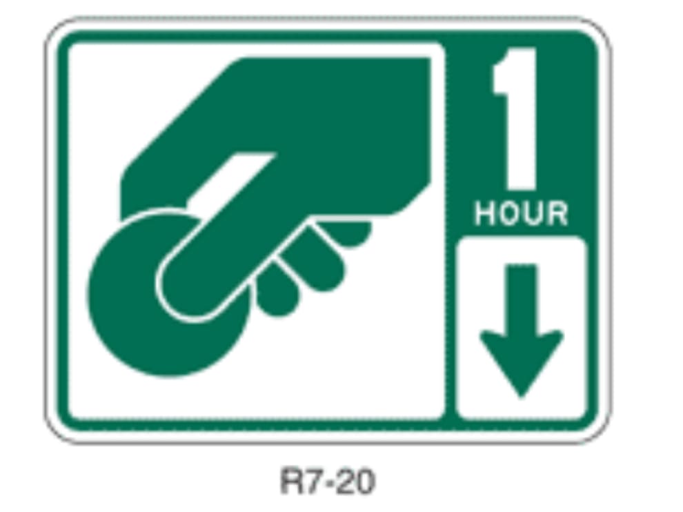 Open Hand Control What the green traffic sign with a hand holding a coin accompanied by a ...