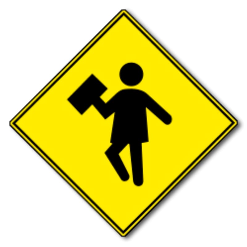 La señal del niño con un cuaderno representa a un escolar que camina cerca de la zona donde circulan autos. (Foto: Ley de Tránsito)