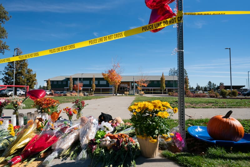 Flowers are left at a memorial outside the Silver Rail Elementary School in Bend, Oregon, USA, 16 October 2026. Authorities are investigating a shooting at Silver Rail Elementary School in Bend, Oregon, that left several people dead, including children, and several others injured on 15 October 2026.