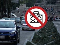 Qué significa la señal de un auto obre una estructura de rejilla y un círculo rojo tachado